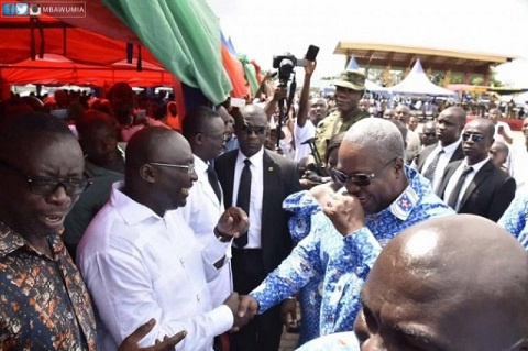 President John Dramani Mahama in a handshake with Dr Bawumia