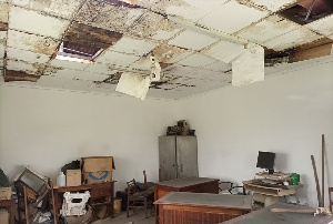 A tattered roof and office in the Tarkwa Veterinary office