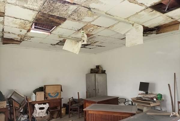 A tattered roof and office in the Tarkwa Veterinary office