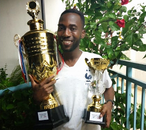 GIJ SRC President, Joseph Agbezuke with the trophies