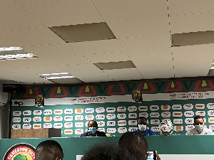 Anicet Yala speaking at a press conference