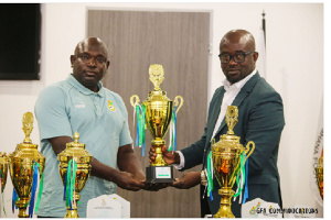 GFA president (right) donates medals to ten regional associations to support Juvenile Leagues