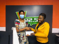 Francisca Lamini [L] receiving her reward