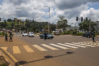 Police officers deviating vehicles on the first day of a national lockdown in Rwanda