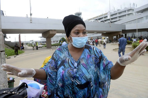 A woman in nose mask