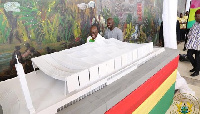 President Akufo-Addo admiring the module of the soon-to-be constructed National Cathedral