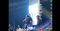 Shatta Wale hugs Stonebwoy's representative who took the award on him behalf