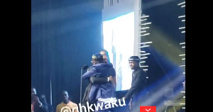 Shatta Wale hugs Stonebwoy's representative who took the award on him behalf