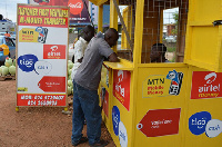 MoMo vendor attending to a  customer