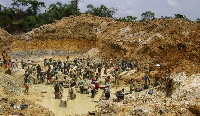 File photo: Illegal miners in a mining pit