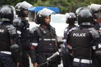 Police officers in riot gear | File photo