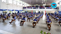 Some students of Presec-Legon writing their first WASSCE paper