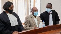 Paul Rusesabagina in a Kigali court with his lawyers on September 14, 2020. PHOTO | CYRIL NDEGEYA |