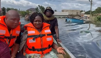 Jane Naana Opoku Agyemang (right) with Okudzeto Ablakwa gone though areas affected by the spillage