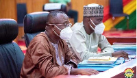 Joe Wise (left) adn Haruna Iddrisu during a committee sitting in Parliament