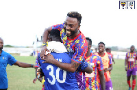 Gladson Awako being celebrated by Hearts manager Samuel Boadu