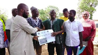 The handing over ceremony of the site for the shopping mall at Damongo