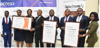 Chief Operating Officer of Access Bank Ghana, Mr. Ade Ologun, others receiving the certificate