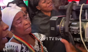 Mother of the late Ghanaian highlife singer, Kofi B (in white) grieving the loss of her son