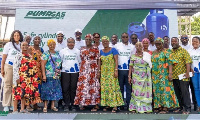 Some of the beneficiaries pictured with Puma Energy officials at the event