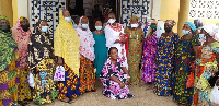 s Mad. Owusu-Banahene (middle) with some of the widows