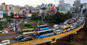 Traffic moves on a flyover before a curfew to contain the coronavirus disease REUTERS/Thomas Mukoya