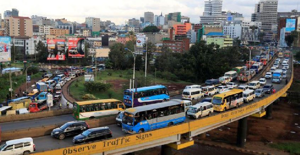 Traffic moves on a flyover before a curfew to contain the coronavirus disease REUTERS/Thomas Mukoya