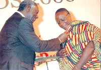 Amankwa-Ampofo being decorated with the Grand Medal