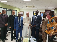 H.E. Rev. Msgr. Jean-Marie Speich poses with the Members of Parliament during his visit