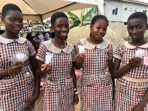 A photo of some of the students holding menstrual cups