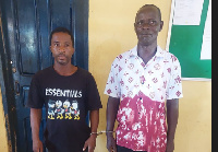 The two were arrested on suspicion of aiding and abetting in the registration of several students