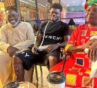 Thomas Partey and his parents in Qatar