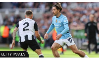 Manchester City's Jack Grealish takes on Newcastle's Kieran Tripper