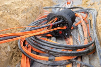 fiber cuts disrupt telecommunications services, causing outages and hindering digital progress