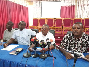 Picture shows Dr. Keelson (middle) addressing the press conference