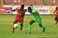 Asante Kotoko say attacker Ollenu Ashittey with a tussle for the ball