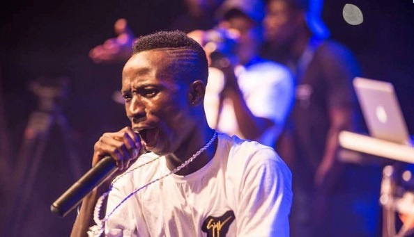 Patapaa performing on stage