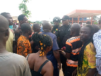 Police calming the angry crowd