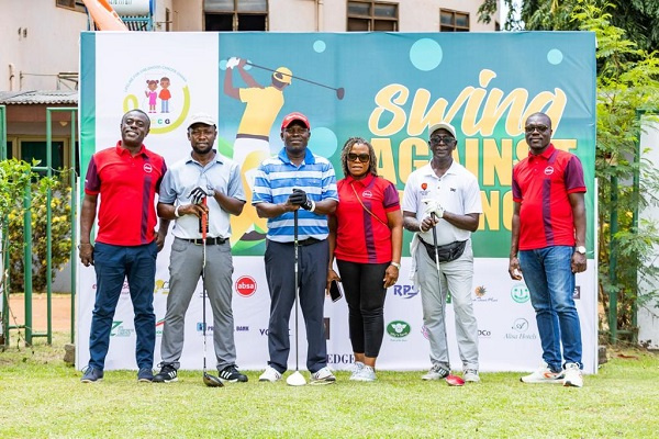 Some officials of Absa Bank at the charity golf event