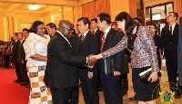 President Akufo-Addo exchanging pleasantries with an official of the Chinese Government