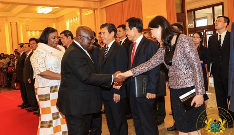 President Akufo-Addo exchanging pleasantries with an official of the Chinese Government