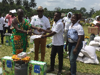 Wassa East 2017 Best farmer flanked by his wife receiving his prizes