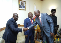 President Akufo-Addo and Former President Mahama sharing a handshake