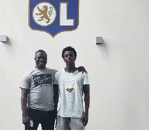 Emmanuel Danso with his agent