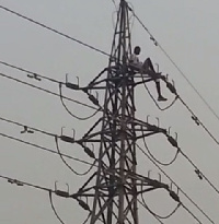 Man demands money from Akufo-Addo by climbing electricity pole