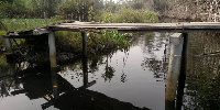 The footbridge is rotten and in a terrible state