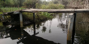 The footbridge is rotten and in a terrible state