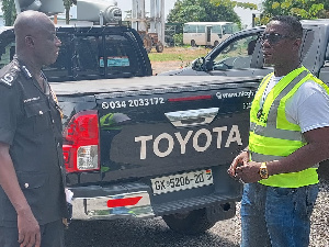 Dr. Justice Ofori (Right) with COP Francis Aboagye Nyarko, Director-General of the Police MTTD