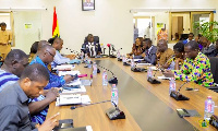 Dr. Mohammed Amin Adam addressing his team at the Ministry of Finance