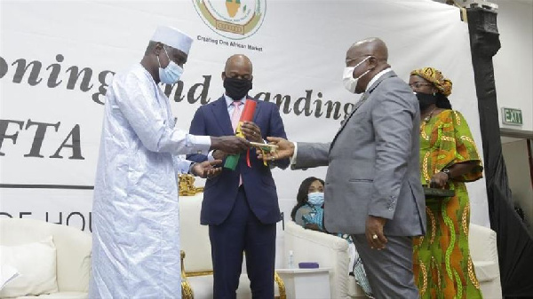 President Akufo-Addo officially handing over the AfCFTA Secretariat to the AU